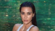 Kim Kardashian was photographed by Greg Swales in the Dominican Republic. Swimsuit by SKIMS. 