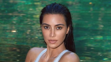Kim Kardashian was photographed by Greg Swales in the Dominican Republic. Swimsuit by SKIMS. 
