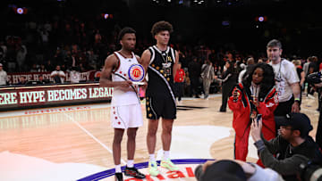 Apr 1, 2025; Brooklyn, NY, USA; McDonald's All American West guard Darryn Peterson (22) and McDonald's All American East forward Cameron Boozer (12) pose for photos after the game at Barclays Center. Mandatory Credit: Pamela Smith-Imagn Images
