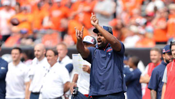 Sep 8, 2024; Cincinnati, Ohio, USA;  New England Patriots head coach Jerod Mayo call a play during the second quarter against the Cincinnati Bengals at Paycor Stadium. Mandatory Credit: Joseph Maiorana-Imagn Images