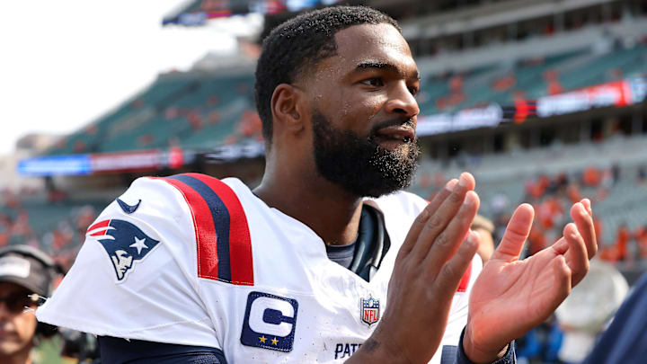 Sep 8, 2024; Cincinnati, Ohio, USA;  New England Patriots quarterback Jacoby Brissett celebrates following the win over the Cincinnati Bengals at Paycor Stadium. Mandatory Credit: Joseph Maiorana-Imagn Images