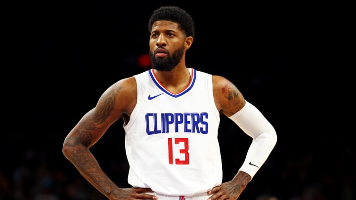 Apr 9, 2024; Phoenix, Arizona, USA;  LA Clippers forward Paul George (13) looks on during the first quarter of the game against the Phoenix Suns at Footprint Center. Mandatory Credit: