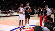 Apr 1, 2025; Brooklyn, NY, USA; McDonald's All American West guard Darryn Peterson (22) and McDonald's All American East forward Cameron Boozer (12) pose for photos after the game at Barclays Center. Mandatory Credit: Pamela Smith-Imagn Images