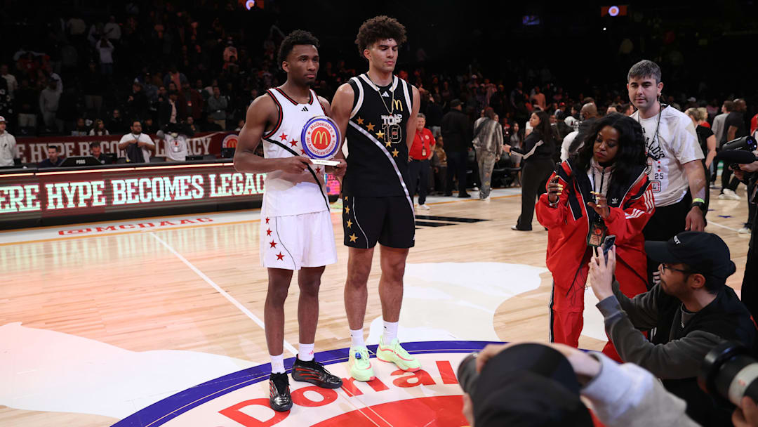 Apr 1, 2025; Brooklyn, NY, USA; McDonald's All American West guard Darryn Peterson (22) and McDonald's All American East forward Cameron Boozer (12) pose for photos after the game at Barclays Center. Mandatory Credit: Pamela Smith-Imagn Images