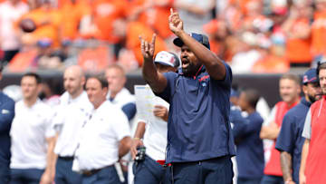 Sep 8, 2024; Cincinnati, Ohio, USA;  New England Patriots head coach Jerod Mayo call a play during the second quarter against the Cincinnati Bengals at Paycor Stadium.
