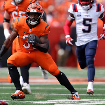 Sep 8, 2024; Cincinnati, Ohio, USA;  Cincinnati Bengals running back Zack Moss (31) runs the ball during the first quarter against the New England Patriots at Paycor Stadium. Mandatory Credit: Joseph Maiorana-Imagn Images