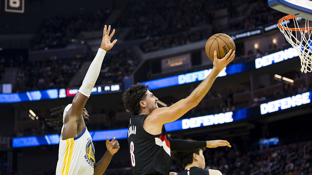 Oct 8, 2025; San Francisco, California, USA;  Portland Trail Blazers forward Deni Avdija (8) shoots in front of Golden State Warriors guard Buddy Hield (7) during the second quarter at Chase Center. Mandatory Credit: John Hefti-Imagn Images