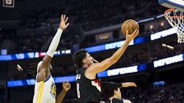 Oct 8, 2025; San Francisco, California, USA;  Portland Trail Blazers forward Deni Avdija (8) shoots in front of Golden State Warriors guard Buddy Hield (7) during the second quarter at Chase Center. Mandatory Credit: John Hefti-Imagn Images