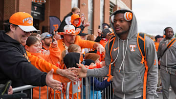 Tennessee wide receiver Squirrel White (3) high-fives fans during the Vol Walk ahead of Tennessee's game against UTEP in Neyland Stadium on Saturday, November 23, 2024.