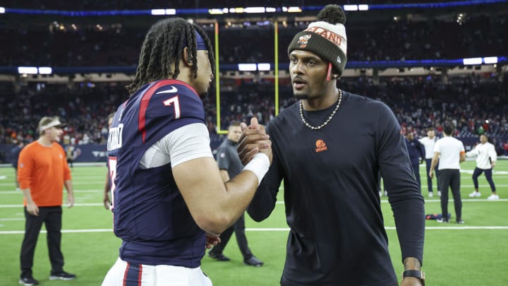 Jan 13, 2024; Houston, Texas, USA; Houston Texans quarterback C.J. Stroud (7) and Cleveland Browns quarterback Deshaun Watson greet on the field after a 2024 AFC wild card game at NRG Stadium. Mandatory Credit: Troy Taormina-USA TODAY Sports