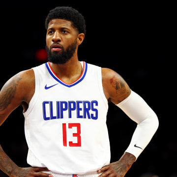 Apr 9, 2024; Phoenix, Arizona, USA;  LA Clippers forward Paul George (13) looks on during the first quarter of the game against the Phoenix Suns at Footprint Center. Mandatory Credit: Mark J. Rebilas-USA TODAY Sports