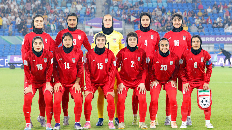 Iran women’s soccer poses before game
