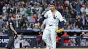 Oct 1, 2025; Bronx, New York, USA; New York Yankees relief pitcher Fernando Cruz (63) celebrates a bases loaded fly out to end the seventh inning against the Boston Red Sox during game two of the Wildcard round for the 2025 MLB playoffs at Yankee Stadium. Mandatory Credit: Brad Penner-Imagn Images