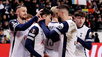 Spurs players celebrate the third goal of the game