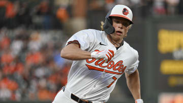 Apr 16, 2024; Baltimore, Maryland, USA; Baltimore Orioles second baseman Jackson Holliday (7) rounds third base to score on shortstop Gunnar Henderson (not pictured) third inning single against the Minnesota Twins at Oriole Park at Camden Yards. Mandatory Credit: Tommy Gilligan-USA TODAY Sports