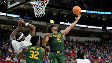 Mar 21, 2025; Raleigh, NC, USA; Baylor Bears forward Norchad Omier (15) reaches for the ball against the Mississippi State Bulldogs during the second half in the first round of the NCAA Tournament at Lenovo Center. Mandatory Credit: Zachary Taft-Imagn Images