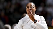 Jan 4, 2025; College Station, Texas, USA; Texas Longhorns head coach Rodney Terry looks on during the first half against the Texas A&M Aggies at Reed Arena. The Aggies defeated the Longhorns 80-60. Mandatory Credit: Maria Lysaker-Imagn Images 