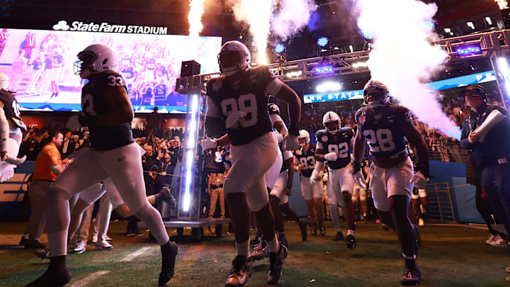 Penn State football team running out onto the field for the Fiesta Bowl