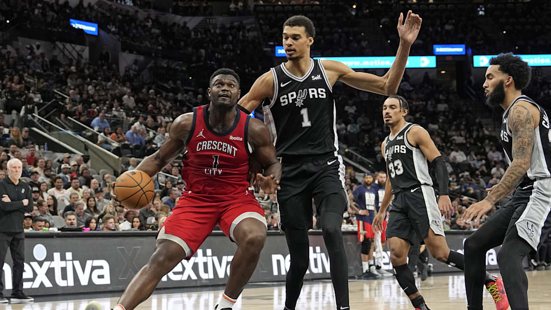 Feb 2, 2024; San Antonio, Texas, USA; New Orleans Pelicans forward Zion Williamson (1) drives to the basket while defended by San Antonio Spurs forward Victor Wembanyama (1) during the first half at Frost Bank Center. Mandatory Credit: Scott Wachter-Imagn Images Feb 2, 2024; San Antonio, Texas, USA; New Orleans Pelicans forward Zion Williamson (1) drives to the basket while defended by San Antonio Spurs forward Victor Wembanyama (1) during the first half at Frost Bank Center. Mandatory Credit: Scott Wachter-Imagn Images