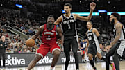 Feb 2, 2024; San Antonio, Texas, USA; New Orleans Pelicans forward Zion Williamson (1) drives to the basket while defended by San Antonio Spurs forward Victor Wembanyama (1) during the first half at Frost Bank Center. Mandatory Credit: Scott Wachter-Imagn Images
