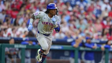 Sep 14, 2024; Philadelphia, Pennsylvania, USA; New York Mets shortstop Luisangel Acuna (2) runs out a single against the Philadelphia Phillies during the ninth inning at Citizens Bank Park. Mandatory Credit: Gregory Fisher-Imagn Images