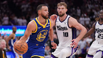 Apr 16, 2024; Sacramento, California, USA; Golden State Warriors guard Stephen Curry (30) dribbles the ball in front of Sacramento Kings forward Domantas Sabonis (10) in the fourth quarter during a play-in game of the 2024 NBA playoffs at the Golden 1 Center. Mandatory Credit: Cary Edmondson-Imagn Images