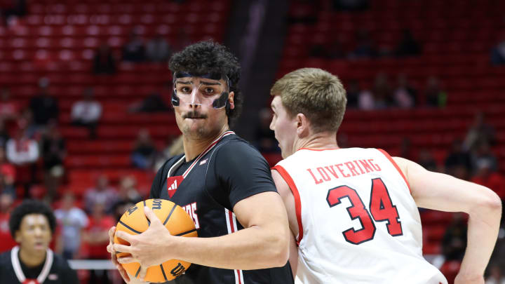 Dec 5, 2023; Salt Lake City, Utah, USA; Southern Utah Thunderbirds forward Parsa Fallah (22) drives against Utah Utes center Lawson Lovering (34) during the first half at Jon M. Huntsman Center. Mandatory Credit: Rob Gray-USA TODAY Sports