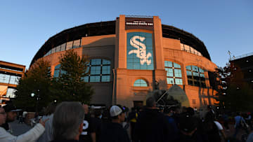 Chicago, IL, USA; Fans walk outside as the sun sets prior to a game between the Chicago White Sox and the Los Angeles Angels at Guaranteed Rate Field. Mandatory Credit: Patrick Gorski-Imagn Images