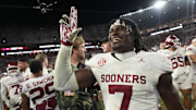 Oklahoma linebacker Sammy Omosigho celebrates after the Sooners defeated Alabama.