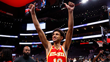 Zaccharie Risacher gives two thumbs up to the home crowd after a game against the New York Knicks