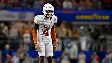 Jan 10, 2025; Arlington, TX, USA; Texas Longhorns defensive back Andrew Mukuba (4) in action during the game between the Texas Longhorns and the Ohio State Buckeyes at AT&T Stadium.