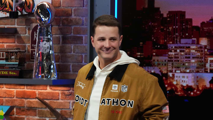 Feb 5, 2026; San Franciso, CA, USA; San Francisco 49ers quarterback Brock Purdy on the Pat McAfee show set at the Super Bowl LX media center at the Moscone Center. Mandatory Credit: Kirby Lee-Imagn Images
