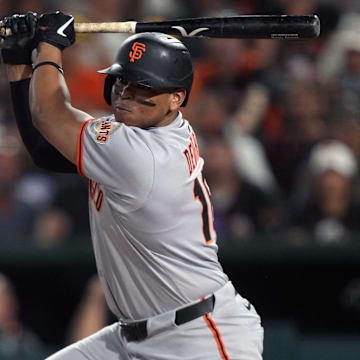 Jul 5, 2025; West Sacramento, California, USA; San Francisco Giants designated hitter Rafael Devers (16) hits a double against the Athletics during the eighth inning at Sutter Health Park.