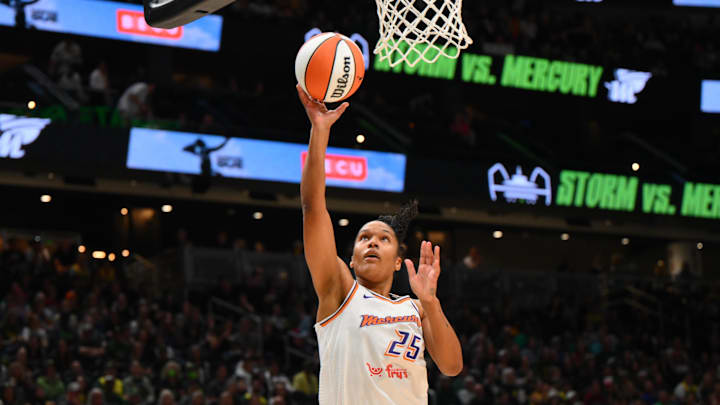 Aug 17, 2025; Seattle, Washington, USA; Phoenix Mercury forward Alyssa Thomas (25) shoots the ball against the Seattle Storm during the first half at Climate Pledge Arena. Mandatory Credit: Steven Bisig-Imagn Images