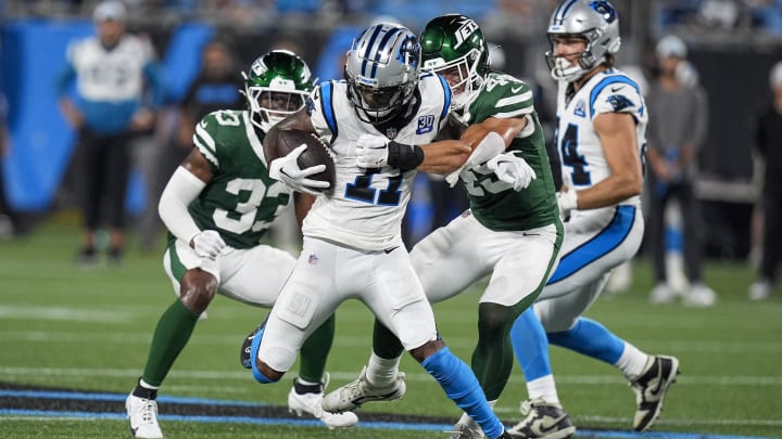 Jets linebacker Jackson Sirmon makes a tackle on  Panthers wide receiver Ihmir Smith-Marsette 