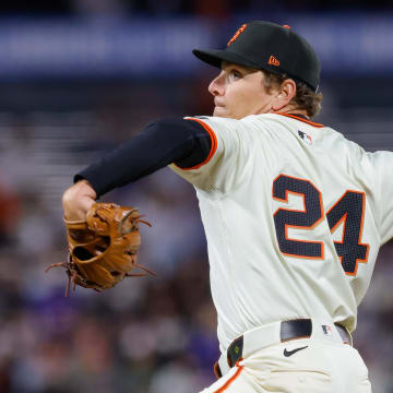 Jun 24, 2024; San Francisco, California, USA; San Francisco Giants pitcher Spencer Howard throws a pitch during the ninth inning against the Chicago Cubs at Oracle Park. All Giants players wore the number 24 in honor of Giants former player Willie Mays. 