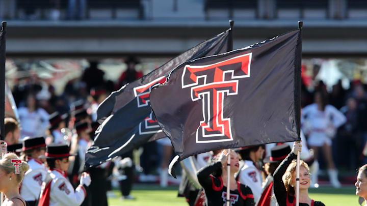 Nov 30, 2024; Lubbock, Texas, USA;  A general view of the Double T flags held by the Goin’ Band from Raiderland color guard before the game between the West Virginia Mountaineers and the Texas Tech Red Raiders at Jones AT&T Stadium and Cody Campbell Field. Mandatory Credit: Michael C. Johnson-Imagn Images