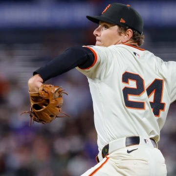 Jun 24, 2024; San Francisco, California, USA; San Francisco Giants pitcher Spencer Howard throws a pitch during the ninth inning against the Chicago Cubs at Oracle Park. All Giants players wore the number 24 in honor of Giants former player Willie Mays. Mandatory Credit: Sergio Estrada-USA TODAY Sports