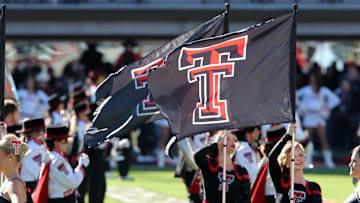Nov 30, 2024; Lubbock, Texas, USA;  A general view of the Double T flags held by the Goin’ Band from Raiderland color guard before the game between the West Virginia Mountaineers and the Texas Tech Red Raiders at Jones AT&T Stadium and Cody Campbell Field. Mandatory Credit: Michael C. Johnson-Imagn Images