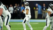 Dec 8, 2025; Inglewood, California, USA; Philadelphia Eagles quarterback Jalen Hurts (1) looks to pass against the Los Angeles Chargers in the first half at SoFi Stadium. Mandatory Credit: Kirby Lee-Imagn Images
