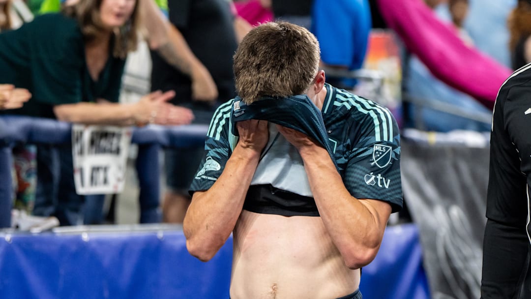 Jun 28, 2025; Seattle, Washington, USA;  Seattle Sounders midfielder Reed Baker-Whiting (21) leaves the pitch after being issued a red card during the second half against Austin FC at Lumen Field. Mandatory Credit: Stephen Brashear-Imagn Images