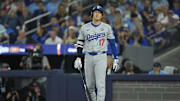 Oct 25, 2025; Toronto, Ontario, CAN; Los Angeles Dodgers two-way player Shohei Ohtani (17) reacts after fouling a ball off of his foot in the eighth inning during game two of the 2025 MLB World Series at Rogers Centre. Mandatory Credit: John E. Sokolowski-Imagn Images