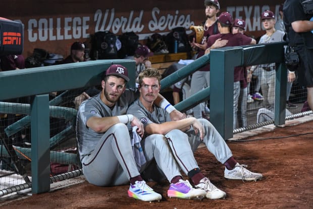 Texas A&M Aggies third baseman Gavin Grahovac (9) and designated hitter Hayden Schott (5) look over the field after a loss.