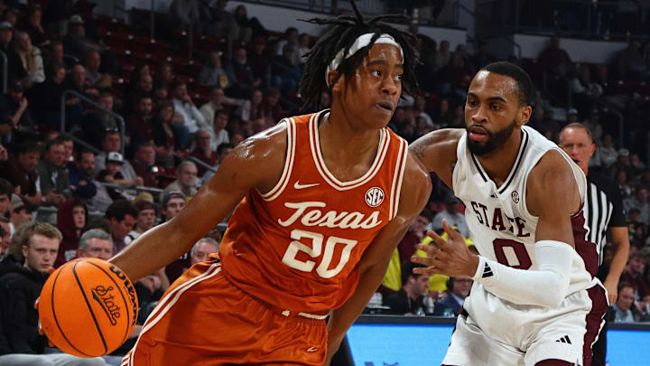Mar 4, 2025; Starkville, Mississippi, USA; Texas Longhorns guard Tre Johnson (20) drives to the basket as Mississippi State Bulldogs guard Claudell Harris Jr. (0) defends during the first half at Humphrey Coliseum. Mandatory Credit: Petre Thomas-Imagn Images Mar 4, 2025; Starkville, Mississippi, USA; Texas Longhorns guard Tre Johnson (20) drives to the basket as Mississippi State Bulldogs guard Claudell Harris Jr. (0) defends during the first half at Humphrey Coliseum. Mandatory Credit: Petre Thomas-Imagn Images
