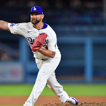 Jul 21, 2025; Los Angeles, California, USA; Los Angeles Dodgers pitcher Kirby Yates (38) throws against the Minnesota Twins during the ninth inning at Dodger Stadium. Mandatory Credit: Gary A. Vasquez-Imagn Images
