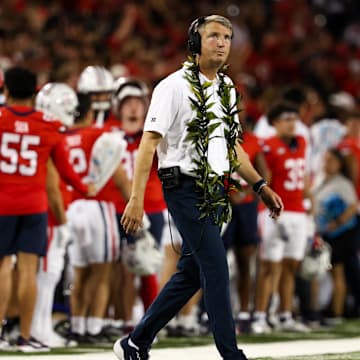 Sep 7, 2024; Tucson, Arizona, USA; Arizona Wildcats head coach Brent Brennan looks at score board against the Northern Arizona Lumberjacks during first quarter at Arizona Stadium. Mandatory Credit: Aryanna Frank-Imagn Images