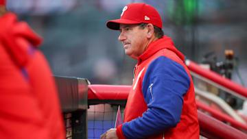 Apr 8, 2025; Atlanta, Georgia, USA; Philadelphia Phillies manager Rob Thomson (59) in the dugout against the Atlanta Braves in the second inning at Truist Park.