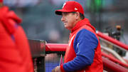 Apr 8, 2025; Atlanta, Georgia, USA; Philadelphia Phillies manager Rob Thomson (59) in the dugout against the Atlanta Braves in the second inning at Truist Park.