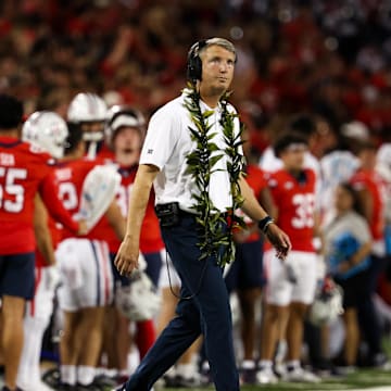 Sep 7, 2024; Tucson, Arizona, USA; Arizona Wildcats head coach Brent Brennan looks at the scoreboard against the Northern Arizona Lumberjacks during the first quarter at Arizona Stadium.