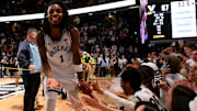 Mar 1, 2025; Nashville, Tennessee, USA;  Vanderbilt Commodores guard Jason Edwards (1) high five the students section as he leaves the court against the Missouri Tigersduring the second half at Memorial Gymnasium. Mandatory Credit: Steve Roberts-Imagn Images